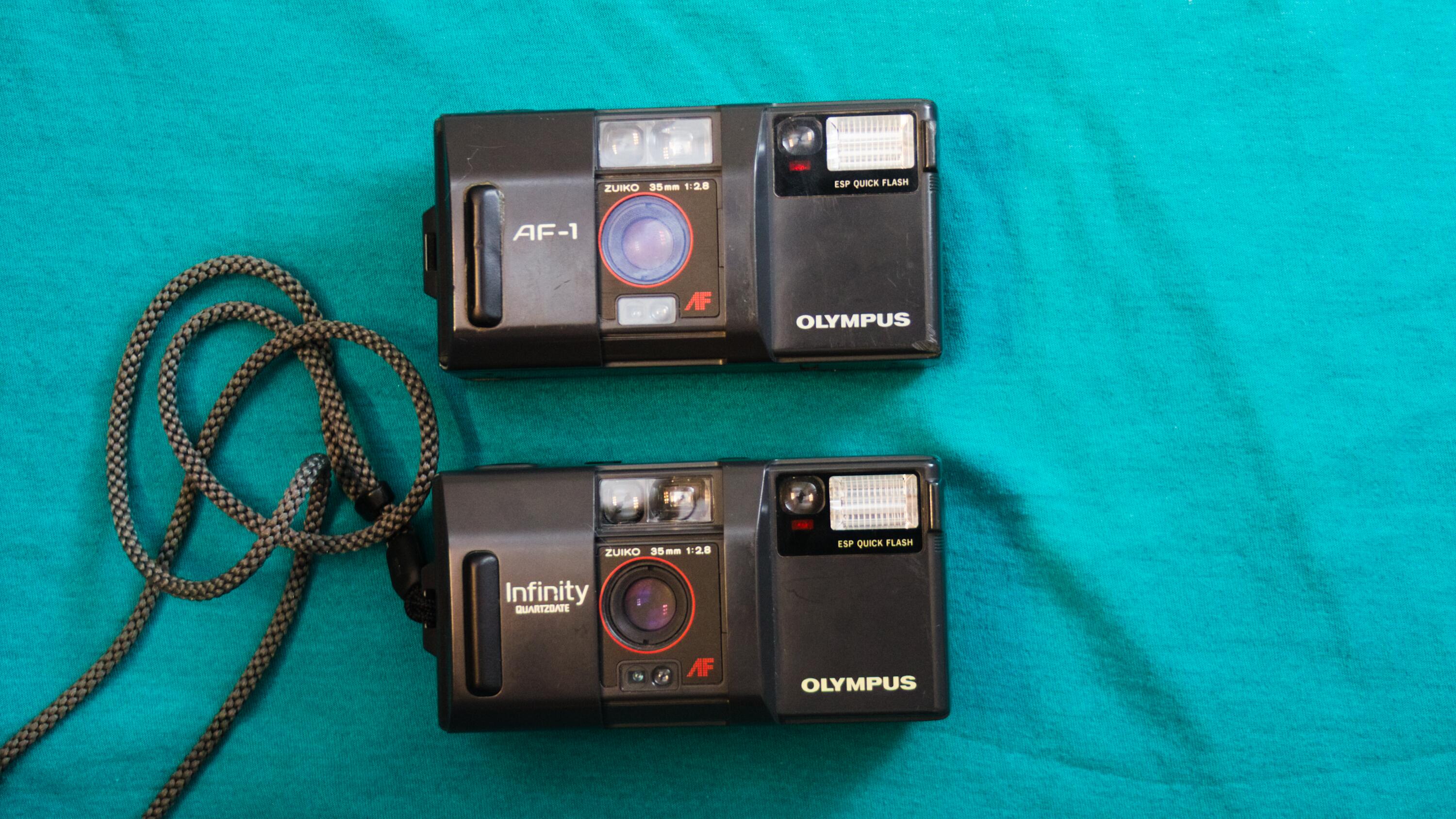 Double feature: Olympus' AF-1, and Infinity Quartzdate